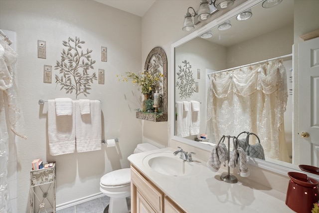 bathroom with tile patterned flooring, a shower with shower curtain, vanity, and toilet