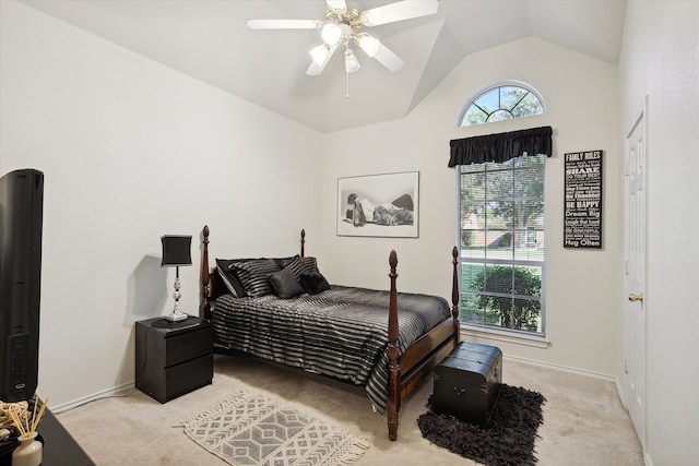 carpeted bedroom featuring vaulted ceiling and ceiling fan