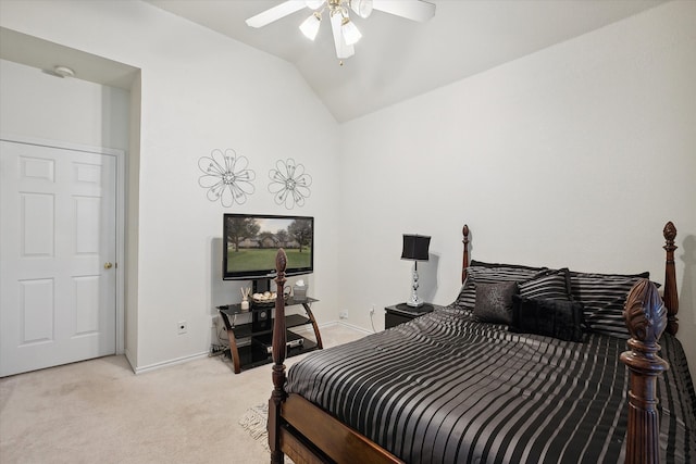 bedroom with light carpet, vaulted ceiling, and ceiling fan