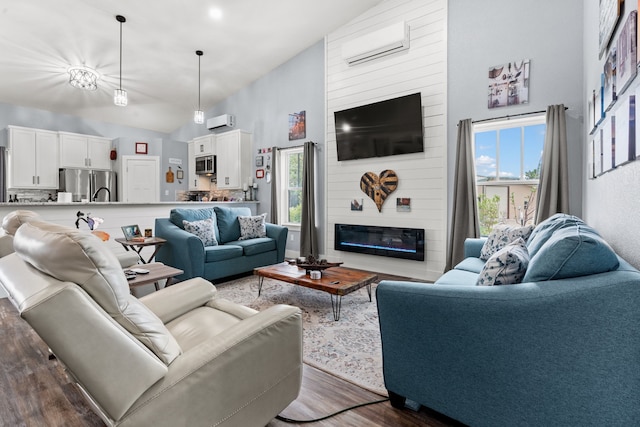 living room featuring a fireplace, dark wood-type flooring, high vaulted ceiling, and a wall unit AC