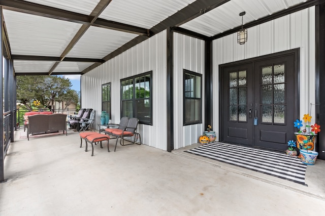 doorway to property with french doors and a patio area