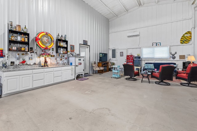 garage featuring a wall mounted air conditioner