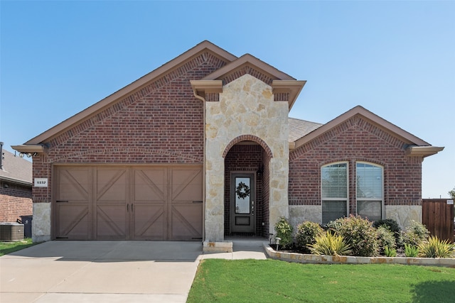 view of front of home featuring a front yard and cooling unit