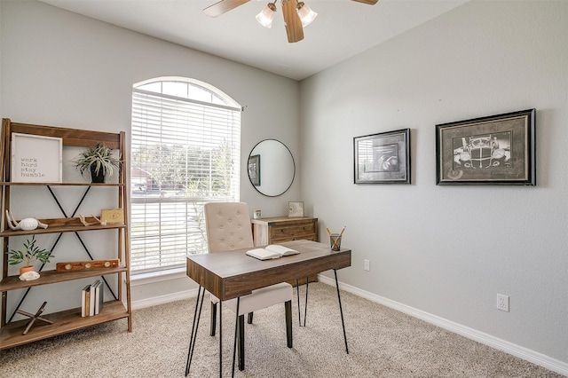 carpeted office with ceiling fan