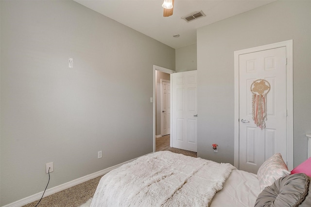 carpeted bedroom featuring ceiling fan