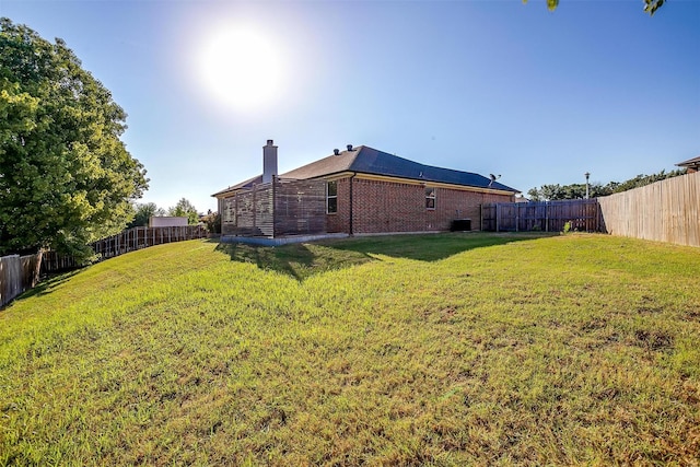 view of yard featuring a fenced backyard