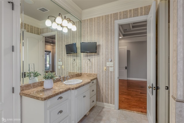 bathroom with vanity, wood-type flooring, and crown molding