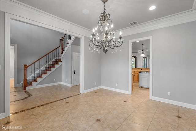 unfurnished dining area featuring an inviting chandelier and ornamental molding