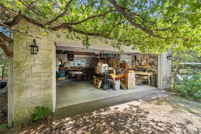 view of patio featuring a garage