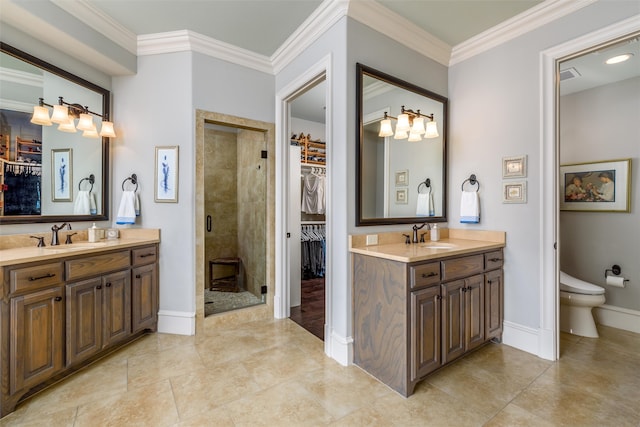 bathroom featuring vanity, crown molding, and a shower with door