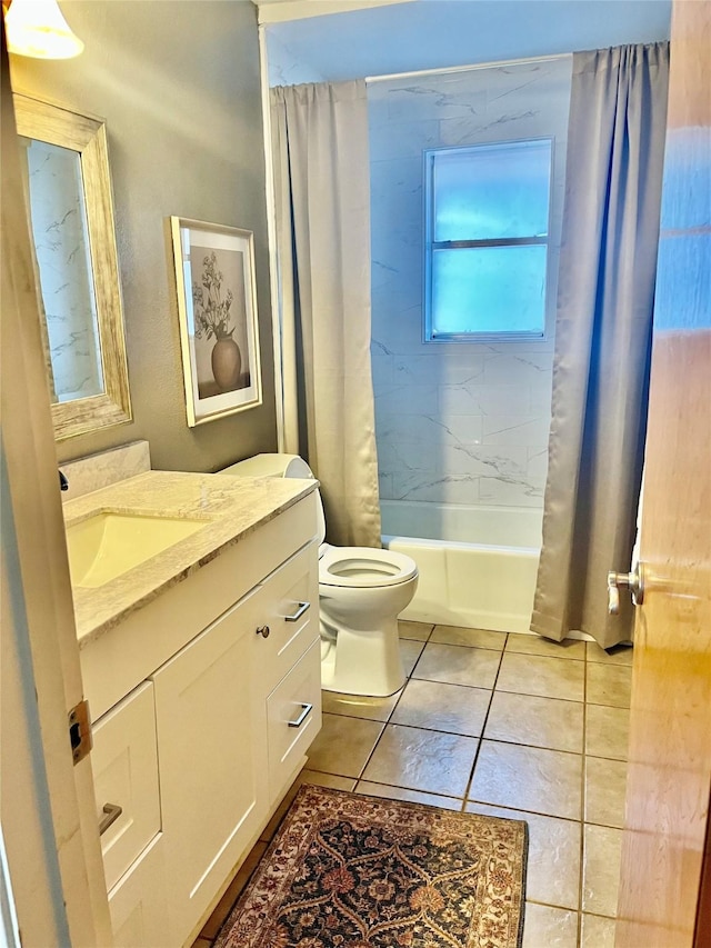 full bathroom featuring tile patterned floors, toilet, shower / tub combo, and vanity