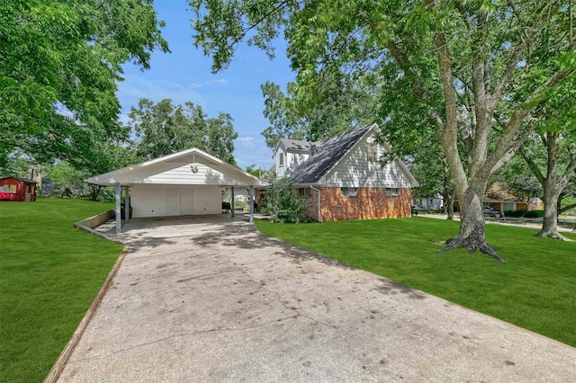 view of front facade with a front lawn and a carport