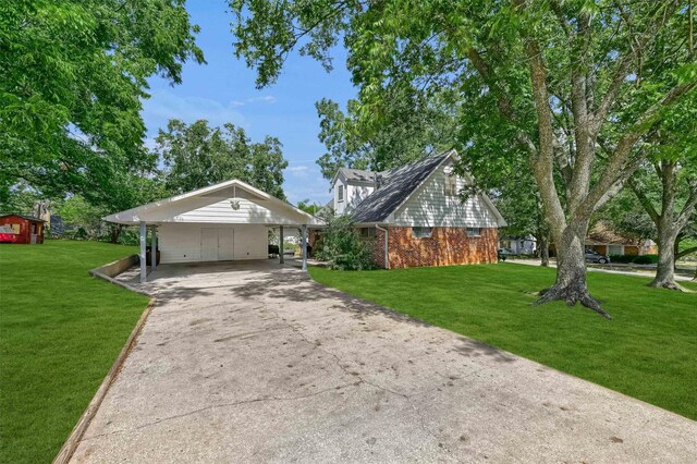 view of front of house with a front lawn and a carport