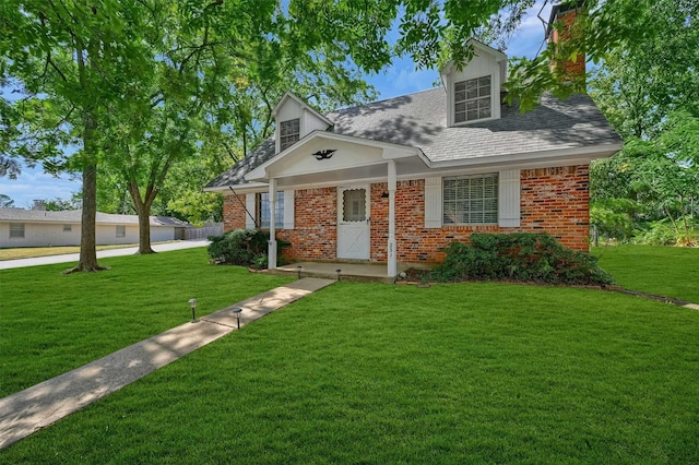 view of front of property with a front lawn