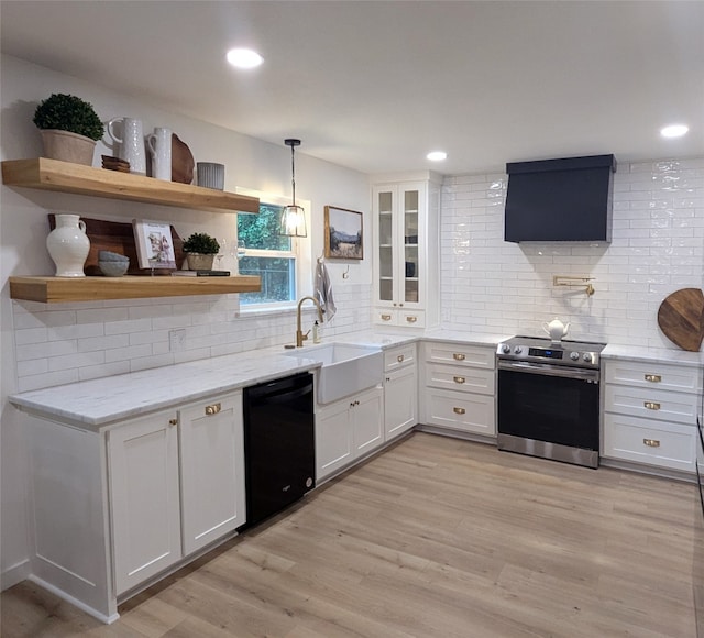 kitchen featuring black dishwasher, white cabinetry, stainless steel electric range oven, and pendant lighting