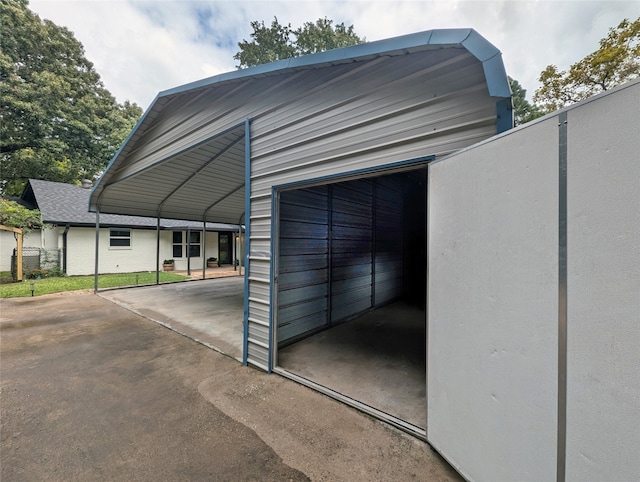 garage with a carport