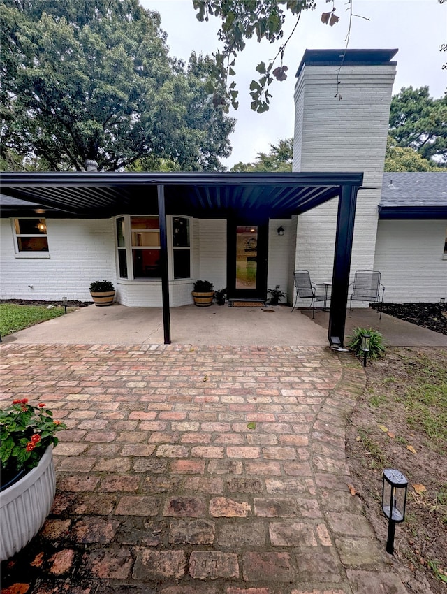 back of house featuring a patio