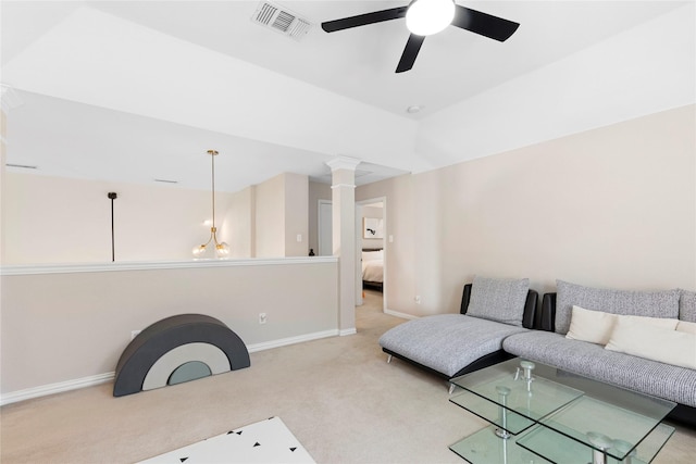 living room with ceiling fan and light carpet