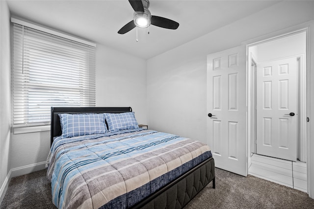 carpeted bedroom featuring ceiling fan