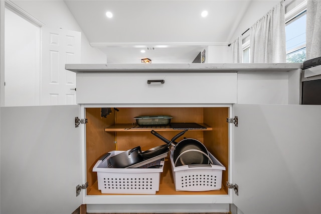 interior details featuring white cabinets