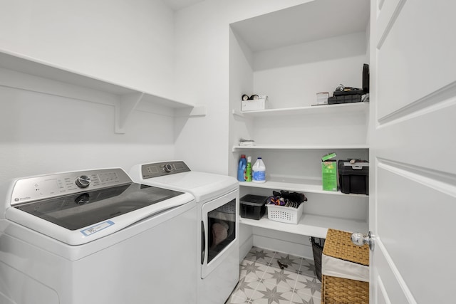 laundry room featuring washer and clothes dryer