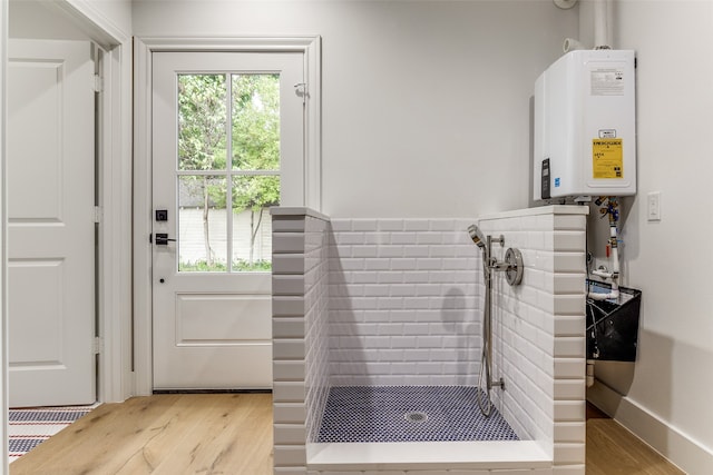 entryway featuring tankless water heater and light wood-type flooring