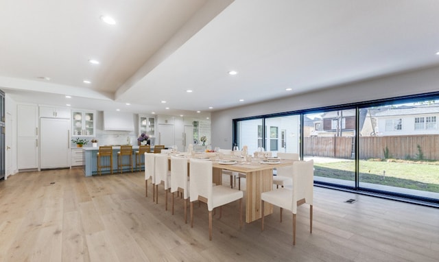 dining area featuring light wood-type flooring