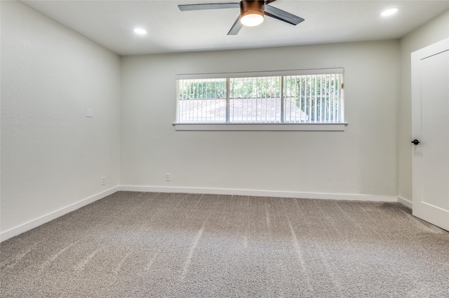 empty room featuring ceiling fan and carpet flooring