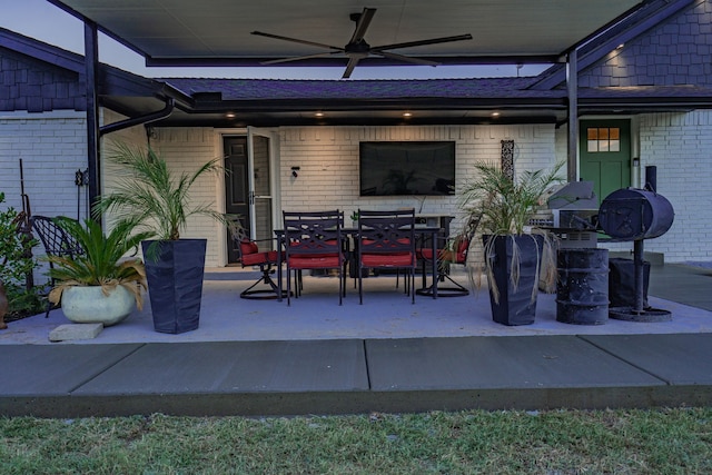 view of patio featuring ceiling fan