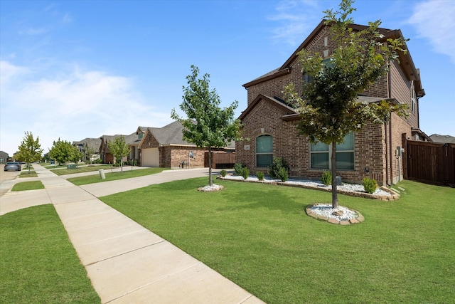 view of front of home with a front lawn