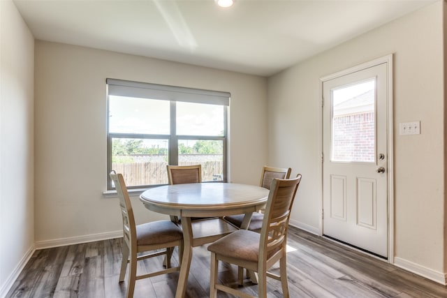 dining area with light hardwood / wood-style floors