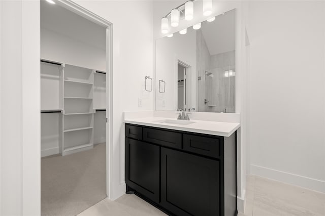 bathroom with vanity and an enclosed shower