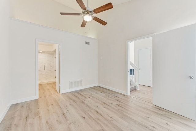 spare room featuring ceiling fan and light hardwood / wood-style flooring