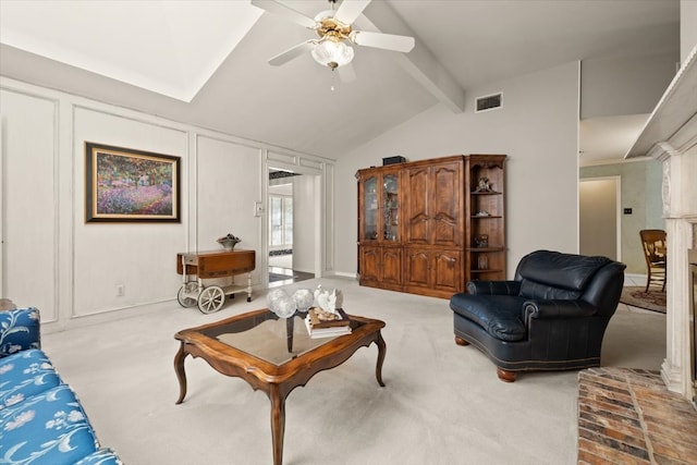 living room featuring ceiling fan, vaulted ceiling with beams, and light carpet