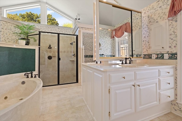 bathroom with vanity, plus walk in shower, and plenty of natural light