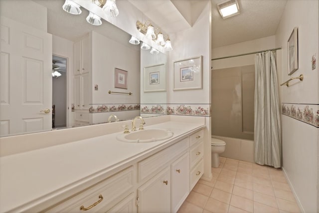 full bathroom featuring vanity, shower / bath combination with curtain, a textured ceiling, tile patterned flooring, and toilet