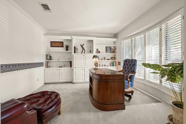 home office featuring ornamental molding, light colored carpet, and a wealth of natural light