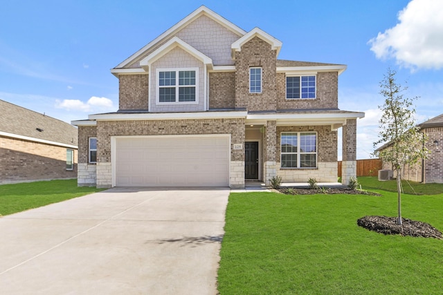 craftsman inspired home with a front yard and a garage