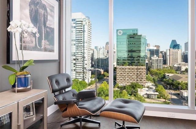 3130 N Harwood St Unit 1506, Dallas, TX 75201 - living area featuring a view of city and wood finished floors