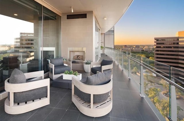 3130 N Harwood St Unit 1506, Dallas, TX 75201 - balcony featuring an outdoor living space and visible vents