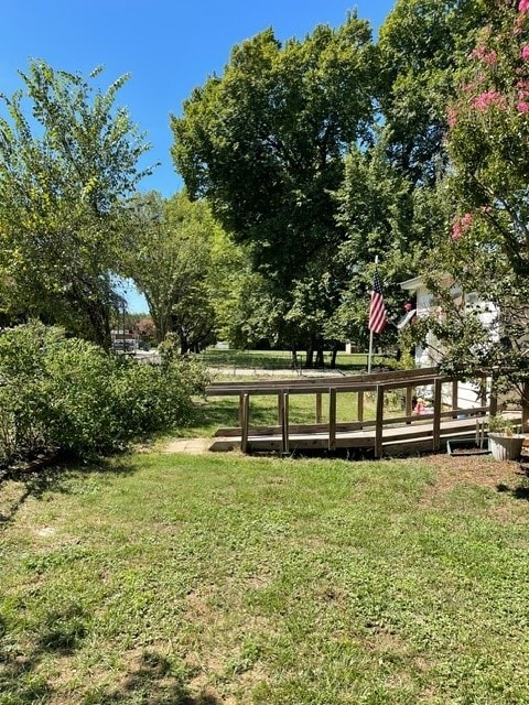 view of community featuring a lawn