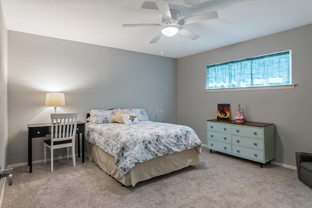 bedroom featuring ceiling fan and carpet floors