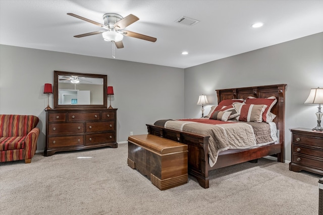 bedroom featuring ceiling fan and light colored carpet