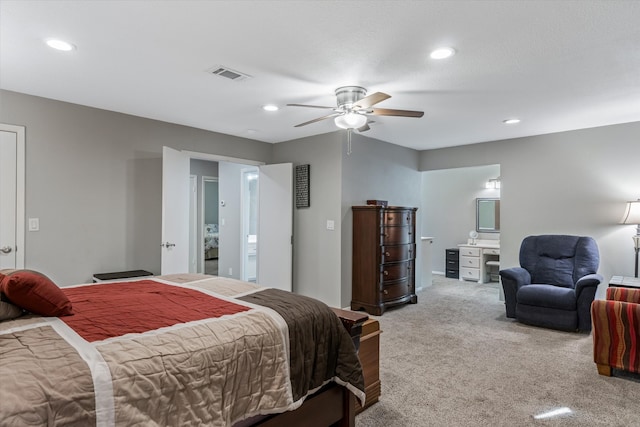 carpeted bedroom with ceiling fan