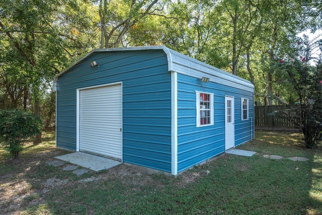 view of outdoor structure featuring a yard