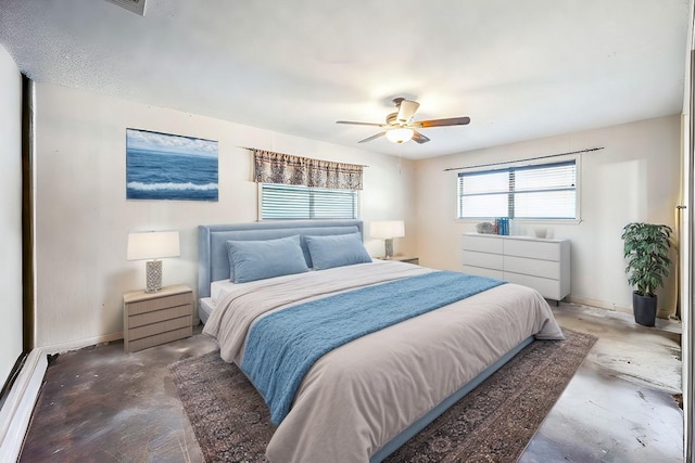 bedroom featuring concrete flooring and ceiling fan