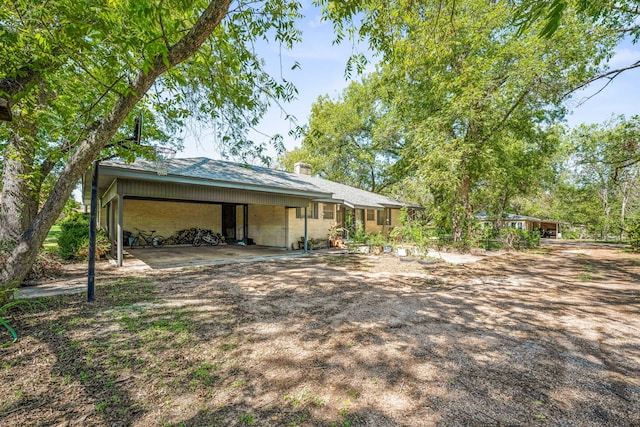 view of yard featuring a carport