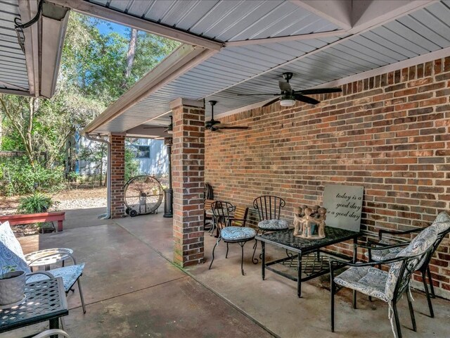 view of patio with a ceiling fan