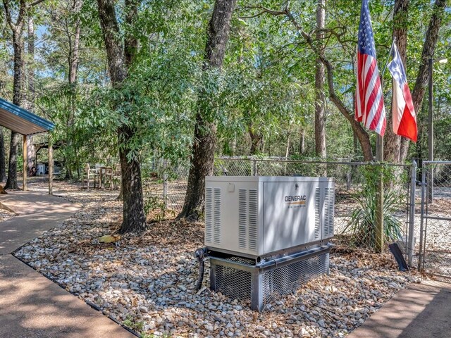 details featuring a power unit and fence