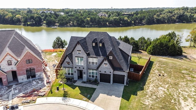 drone / aerial view with a water view